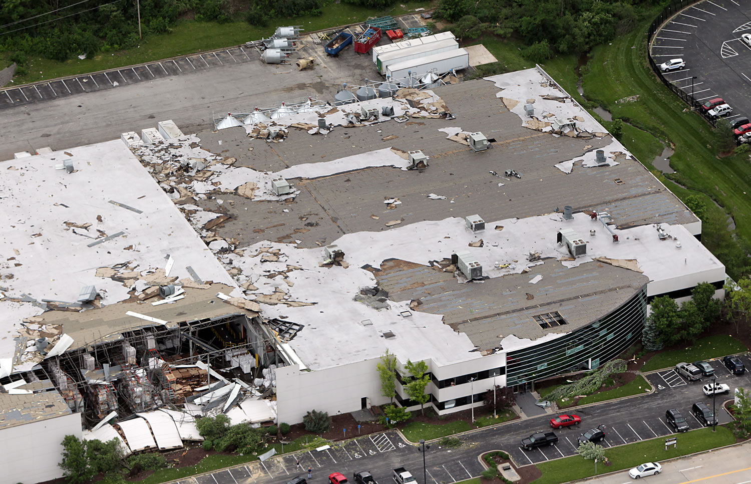A distribution warehouse in the Earth City corridor was heavily damaged during a storm, Saturday in St. Charles County, Mo. The National Weather Service confirms at least two tornados were part of the Friday night storm that raked portions of the St.
