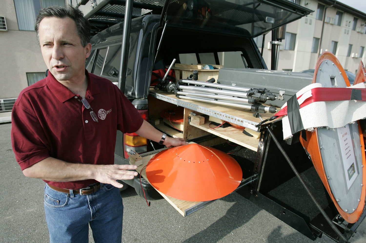 Tornado chaser Tim Samaras shows the probes he uses when trying to collect data in Ames, Iowa, in May 2006. Tim Samaras was killed along with his son, Paul Samaras, and another chaser, Carl Young,  on Friday in Oklahoma City.