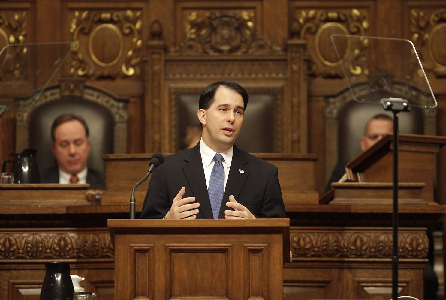 Wisconsin Governor Scott Walker delivers his state budget address in the Assembly chamber of the Wisconsin State Capitol in Madison. The potential GOP presidential candidate says a shutdown of the federal government would violate government's chief responsibility to run, and run efficiently.