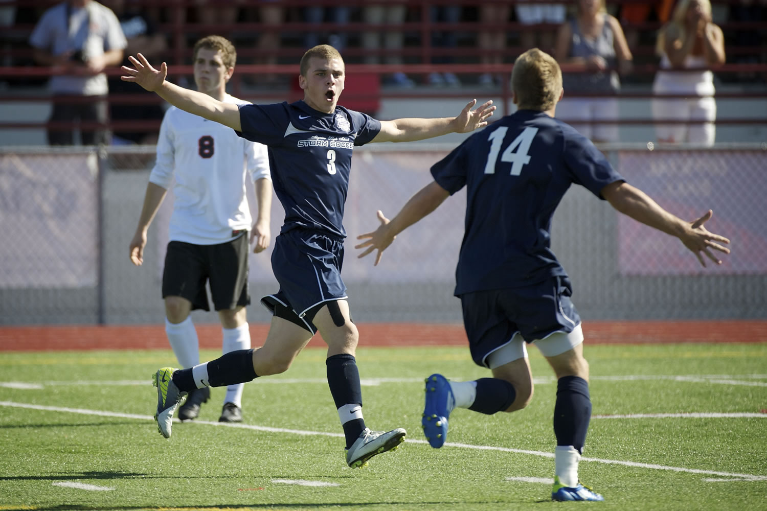 Carter Johnson, 14, and Austin Horner, 3, of Skyview High School celebrate a goal off a header during the first half against Central Kitsap in the boys 4A State Soccer Championship game Saturday May 26, 2012 at Carl Sparks Stadium in Puyallup, Washington. Horner set up the goal as Johnson scored from the pass. Skyview beat Central Kitsap 3-2.
