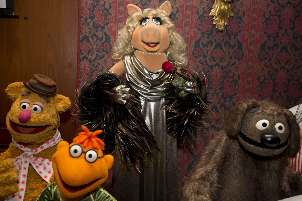A Miss Piggy &quot;muppet&quot;, center, is joined by, from left, Fozzie Bear, Scooter and Rowlf during a ceremony to donate additional Jim Henson objects to the Smithsonian's National Museum of American History in Washington.