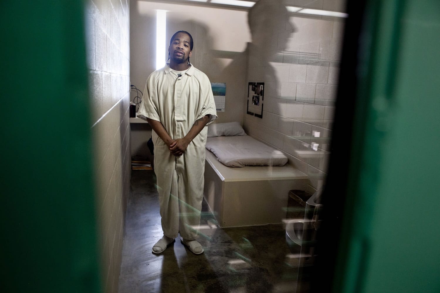 Earnest Collins stands in the Intensive Management Unit at Clallam Bay on July 11. Collins said he's open to change after fights twice landed him in the unit. &quot;If you're not mentally strong, it'll drive you crazy,&quot; Collins said.