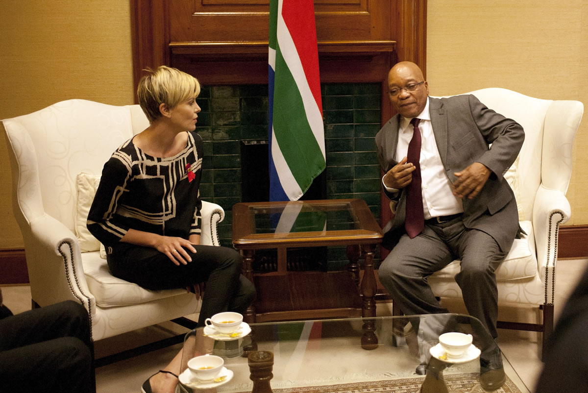 South African President Jacob Zuma, right, meets South African-born Hollywood actress Charlize Theron at his Union Building office in Pretoria, South Africa, on Monday.
