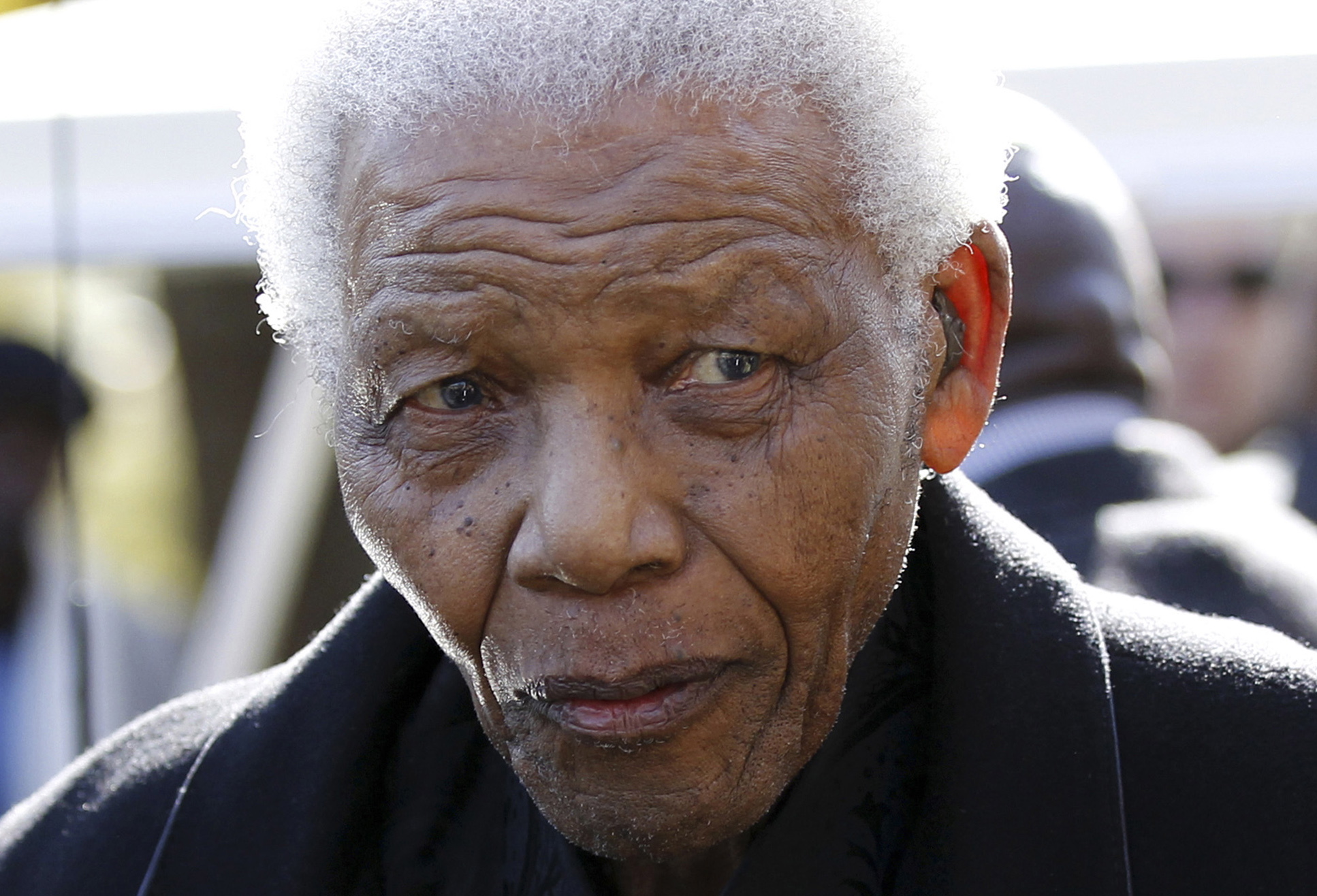Former South African President Nelson Mandela leaves the chapel after attending the funeral of his great-granddaughter Zenani Mandela in Johannesburg, South Africa, in 2010.