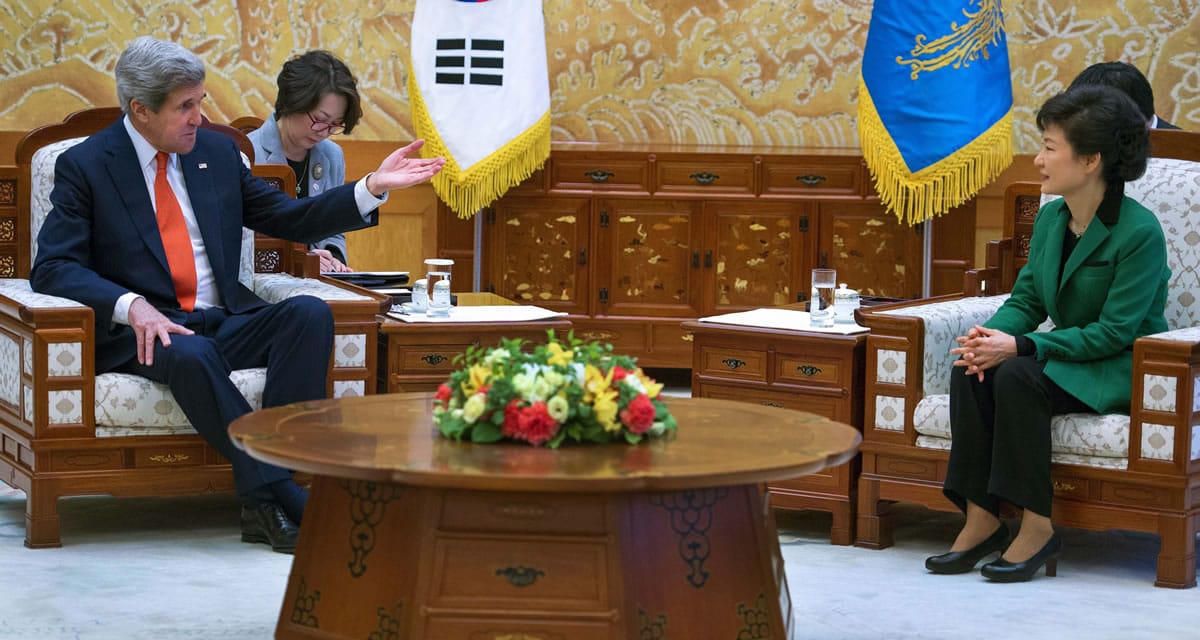 U.S. Secretary of State John Kerry, left, and South Korean President Park Geun-hye chat during a private meeting at the presidential Blue House in Seoul on Friday.