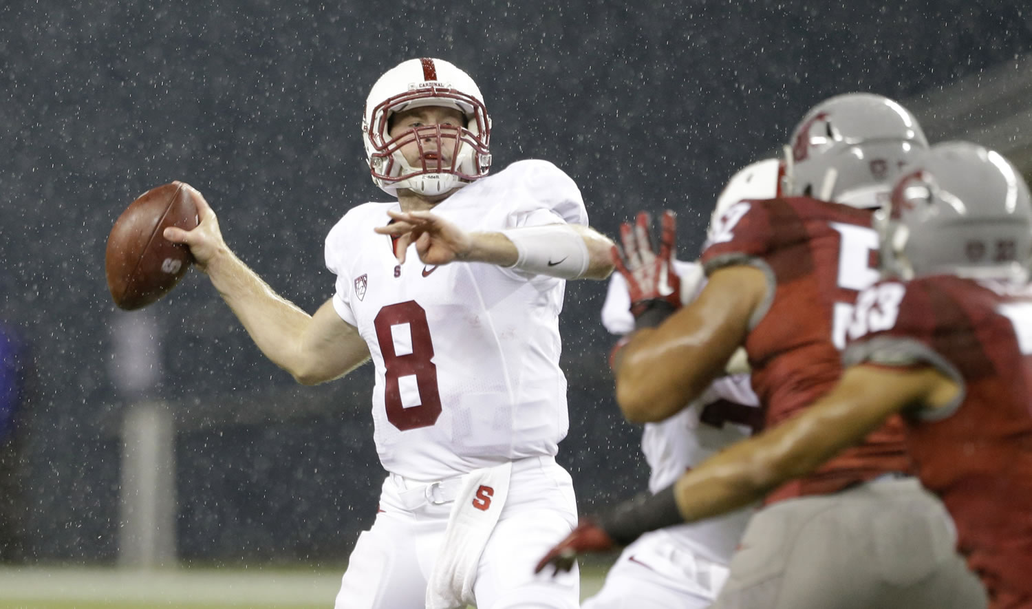 Stanford quarterback Kevin Hogan drops back to pass against Washington State in the second half Saturday.