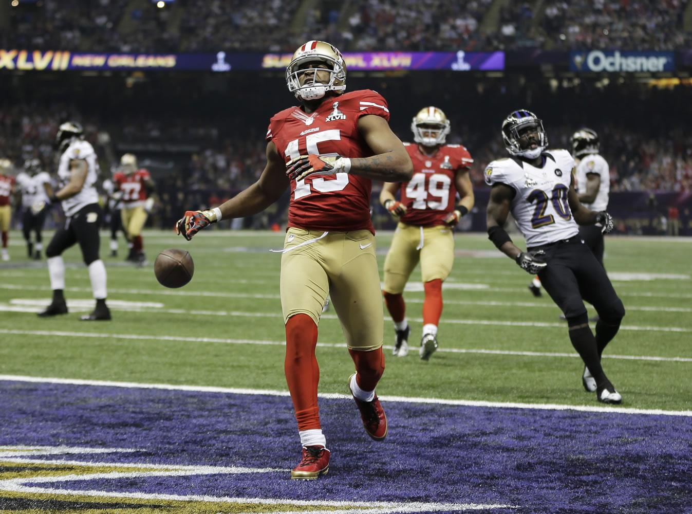 San Francisco 49ers wide receiver Michael Crabtree (15) reacts after scoring a 31-yard touchdown during the second half Sunday.