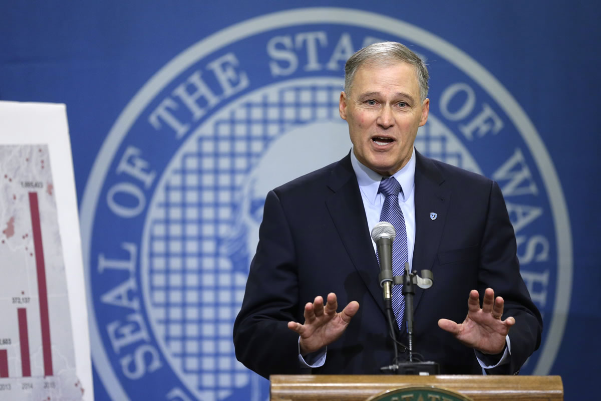 Washington Gov. Jay Inslee talks about his proposed supplemental budget plan Thursday in Olympia. The plan would adjust the current two-year state budget, including putting more money toward covering wildfire costs and increasing mental health spending. Inslee also announced a separate proposal to increase teacher pay. (AP Photo/Ted S.