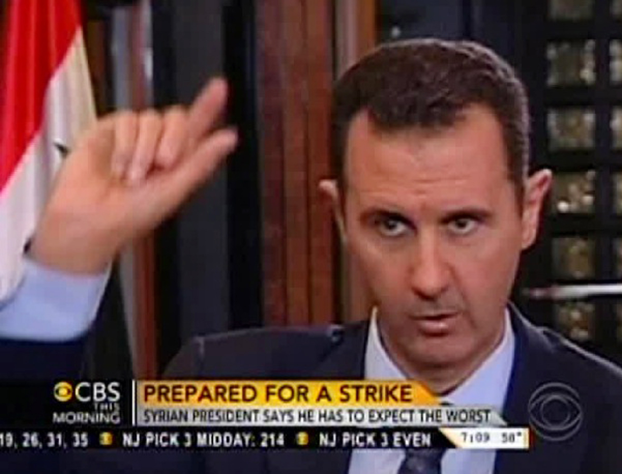 Syrian President Bashar Assad responds to a question from journalist Charlie Rose during an interview on &quot;CBS This Morning,&quot; in Damascus, Syria, on Sunday.