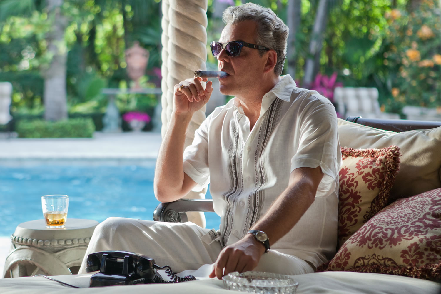 This publicity image released by Starz, shows Danny Huston in a scene from the second season of the series &quot;Magic City,&quot; set in Miami, Fla.  The second season premieres Friday, June 14 at 9 p.m. on Starz.