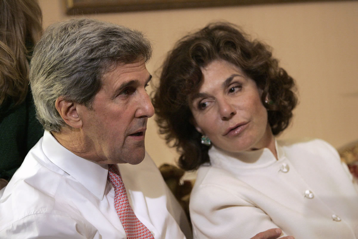 Sen. John Kerry, D-Mass, left, talks with his wife Teresa Heinz Kerry while watching election results Nov. 4, 2008 at a hotel in Boston. A hospital spokesman says Teresa Heinz Kerry was hospitalized Sunday in critical but stable condition in Massachusetts General Hospital in Boston.