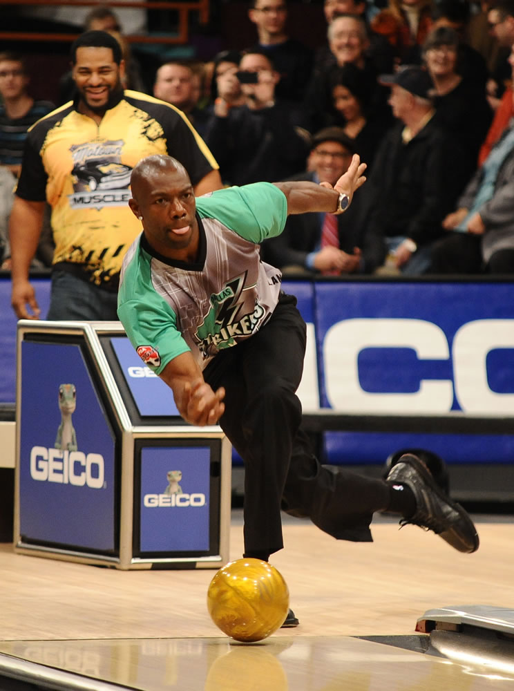 In this photo taken on Jan. 27, 2013, and provided by the Professional Bowlers Association, former NFL football player Terrell  Owens bowls during the PBA Detroit Winter Swing at Thunderbowl Lanes in Allen Park, Mich. Owens has finally found a sport where he doesn't have to worry about getting the ball. He wants to be a professional bowler.