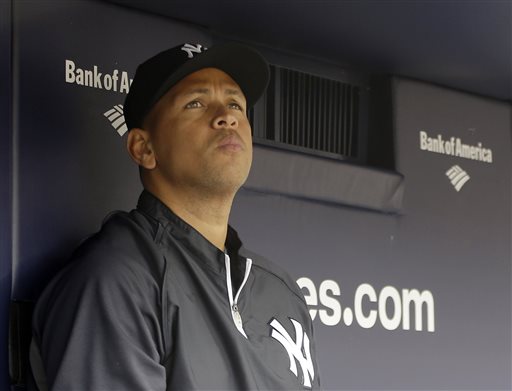 FILE - This April 13, 2013, file photo shows New York Yankees' Alex Rodriguez sitting in the dugout during a baseball game at Yankee Stadium in New York. Three MVP awards, 14 All-Star selections, two record-setting contracts and countless controversies later, A-Rod is the biggest and wealthiest target of an investigation into performance-enhancing drugs, with a decision from baseball Commissioner Bud Selig expected on Monday, Aug. 5, 2013.