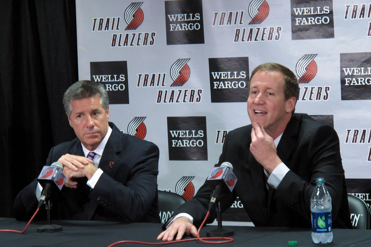 Trail Blazers' new head coach Terry Stotts, right, with general manager Neil Oshey, says plenty of good coaches had losing records in the early parts of their careers.