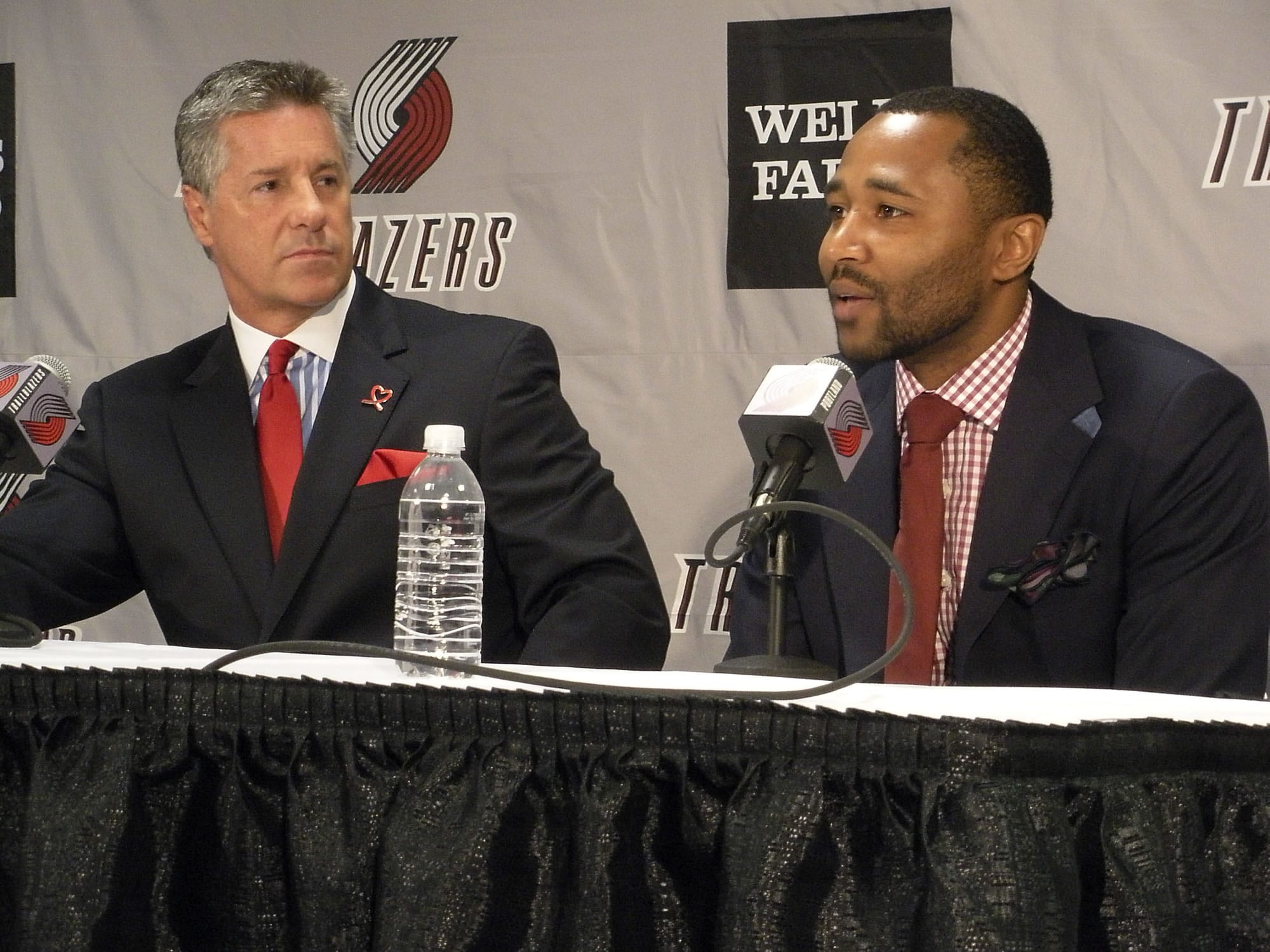 Portland Trail Blazers guard Mo Williams, right, addresses the media after he was introduced as the newest member team by general manager Neil Olshey on Thursday.