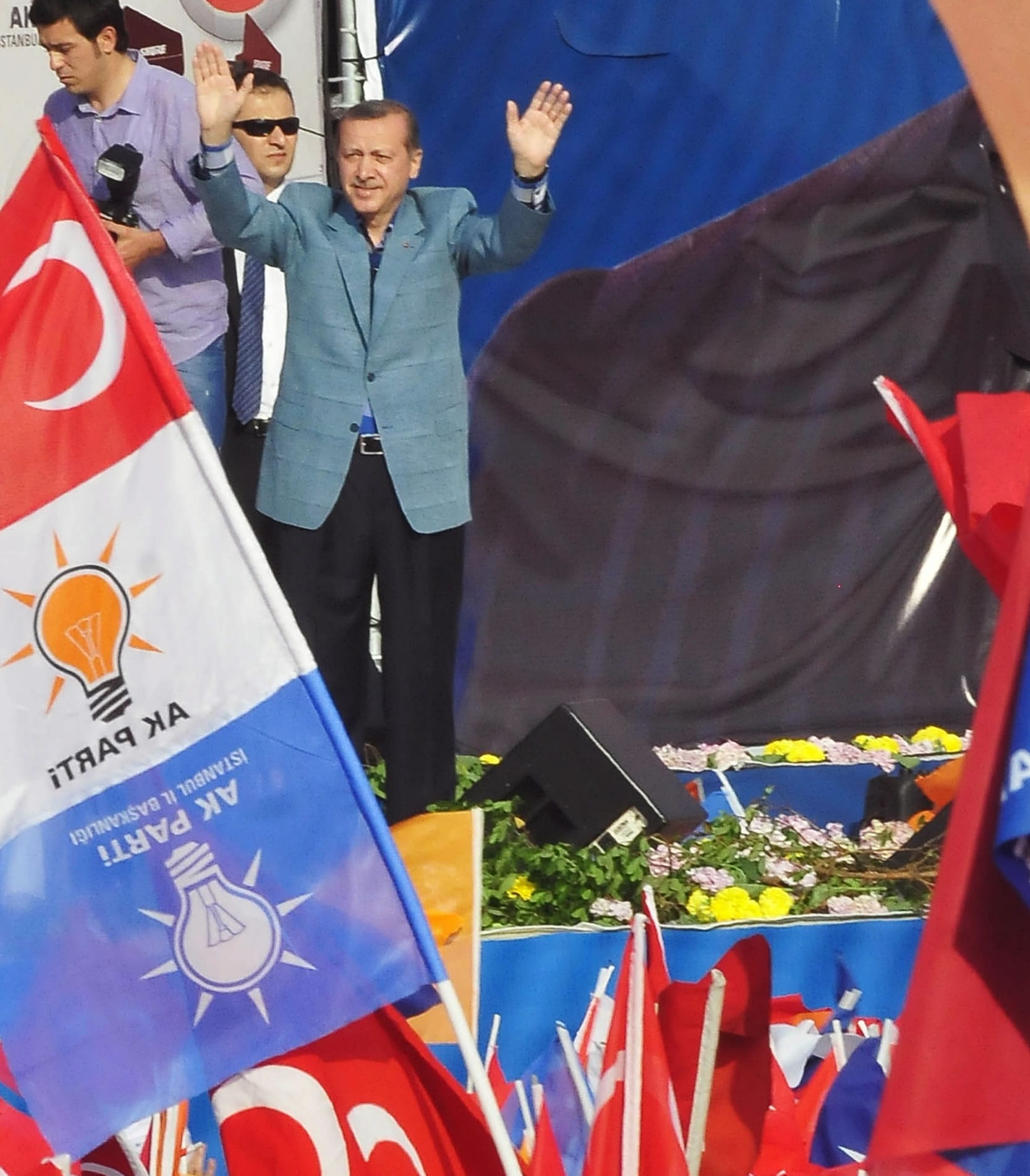 Associated Press
Turkish Prime Minister Recep Tayyip Erdogan salutes supporters Sunday during a party rally in Istanbul, Turkey.