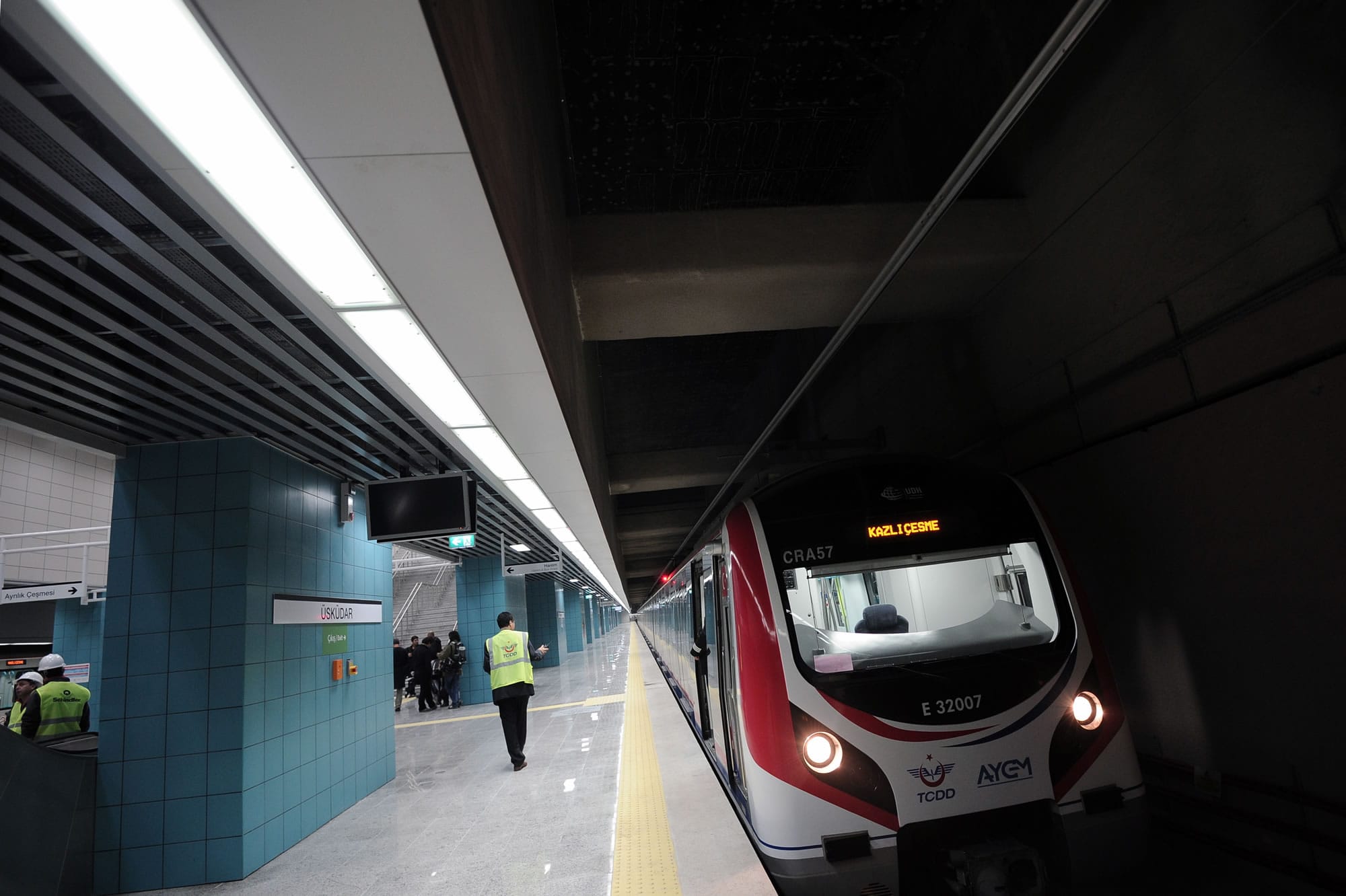 Officials wait to board a passenger train for the inauguration of the Marmaray tunnel on Tuesday in Istanbul, Turkey.