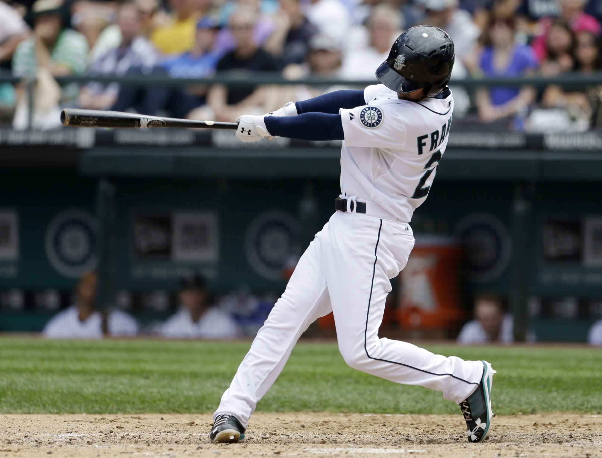 Seattle Mariners' Nick Franklin connects on a three-run home run against the Minnesota Twins in the fourth inning Sunday.