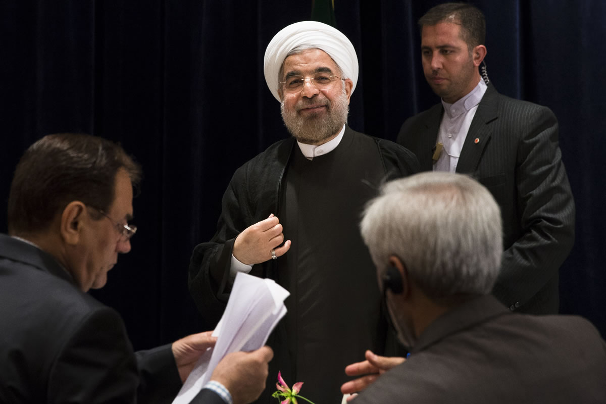 Iranian President Hassan Rouhani smiles at the end of a news conference Friday at the Millennium Hotel in midtown Manhattan.
