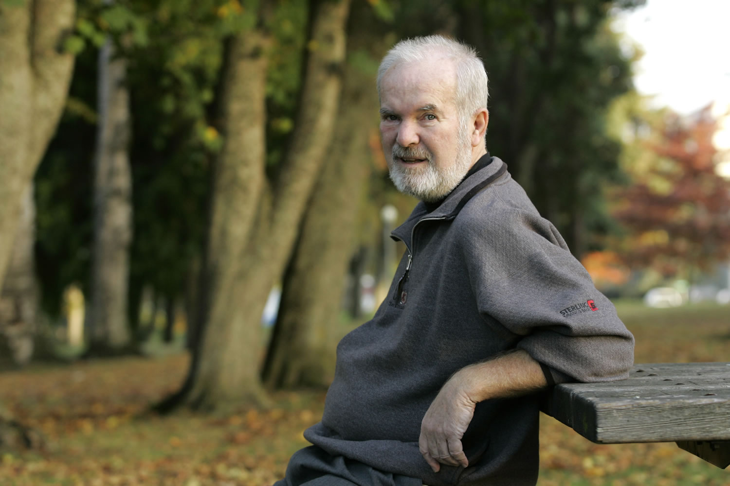 Former Gov. Booth Gardner sits in Wright Park, near his home in Tacoma, on Oct. 25, 2006. Gardner, 76, died March 15 after a long battle with Parkinson's disease.
