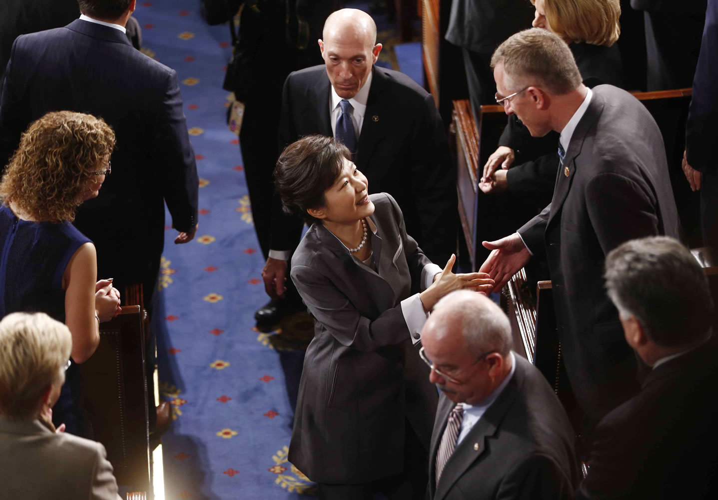 South Korea's President Park Geun-hye greets lawmakers as she leaves the chamber after she addressed a joint session of Congress on Capitol Hill in Washington on Wednesday.