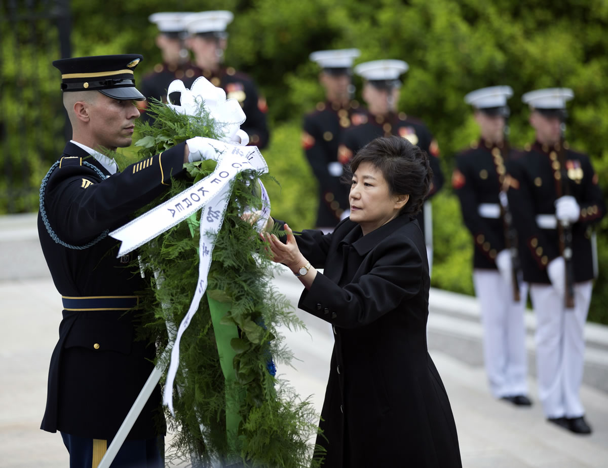 Visiting South Korea President Park Geun-hye lays a wreath at the Tomb of the Unknowns at Arlington National Cemetery in Arlington, Va., on Monday.
