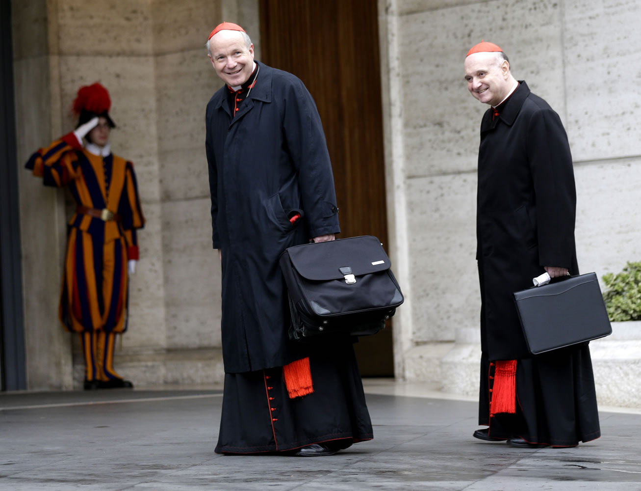 Cardinal Christoph Schoenborn, center, and Cardinal Angelo Comastri  arrive for an afternoon meeting, at the Vatican, Friday, March 8, 2013. The Vatican says the conclave to elect a new pope will likely start in the first few days of next week. The Rev. Federico Lombardi told reporters that cardinals will vote Friday afternoon on the start date of the conclave but said it was &quot;likely&quot; they would choose Monday, Tuesday or Wednesday. The cardinals have been attending pre-conclave meetings to discuss the problems of the church and decide who among them is best suited to fix them as pope.