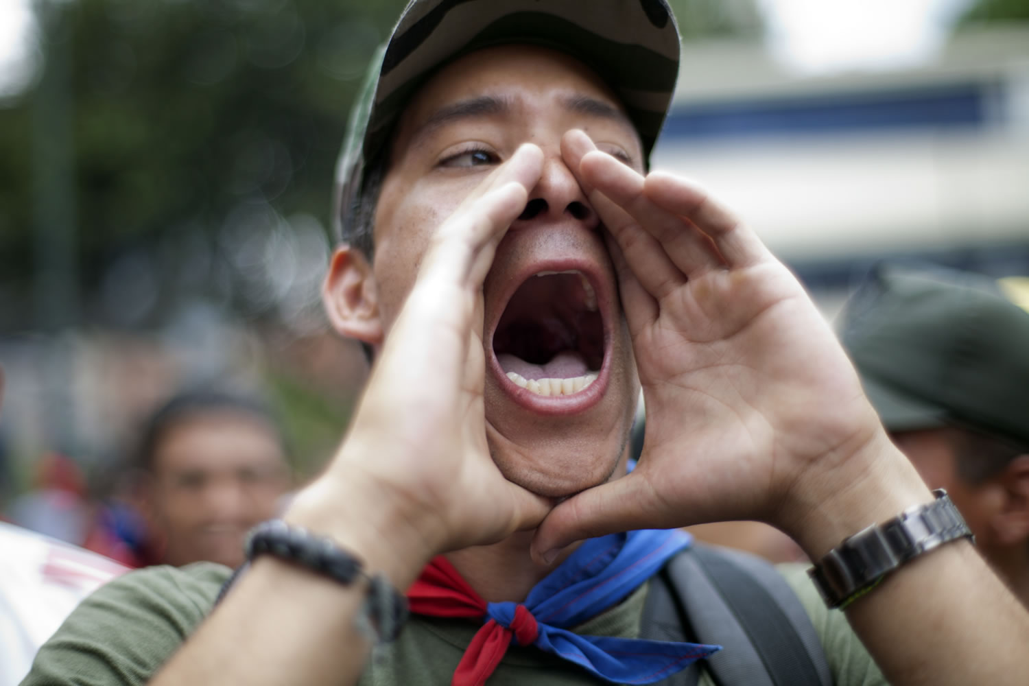 A Chavista demonstrator shouts as supporters of President-elect Nicolas Maduro march in front of the National Electoral Council in Caracas, Venezuela, on Wednesday.