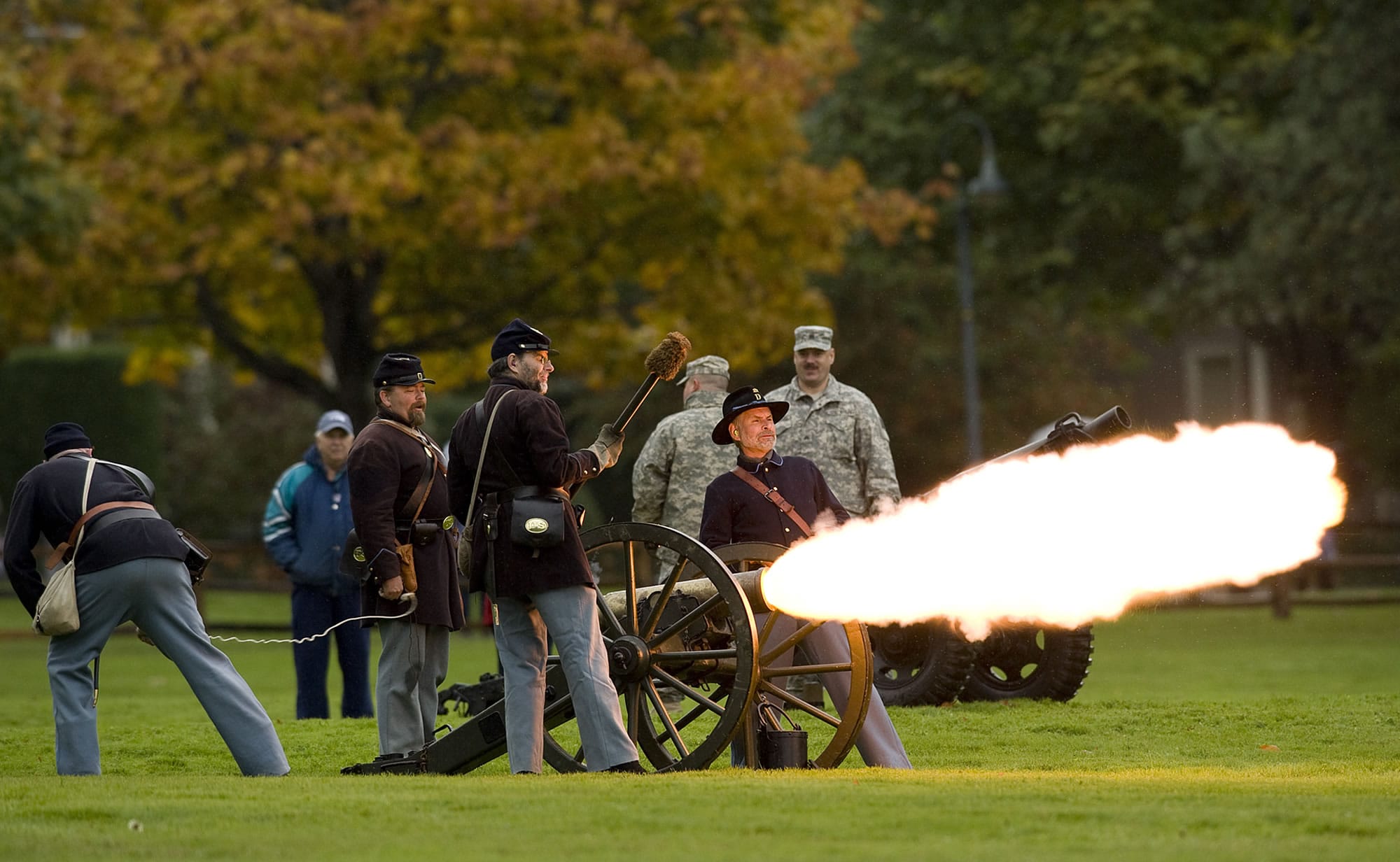 An 1841 mountain Howitzer is fired to start the annual Veterans Parade at Fort Vancouver.