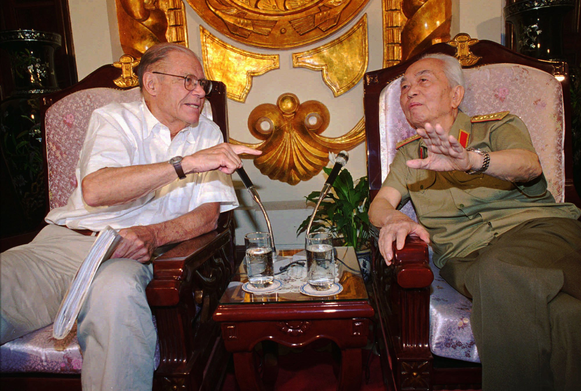 Former U.S. Defense Secretary Robert McNamara, left, speaks to his onetime foe Gen. Vo Nguyen Giap in Hanoi, Vietnam, on June 23, 1997. Officials say Giap, the military mastermind who drove the French and the Americans out of Vietnam, died at a Hanoi hospital Friday at age 102. He was the country's last famous communist revolutionary, and used ingenious guerrilla tactics to overcome enormous odds against superior forces.