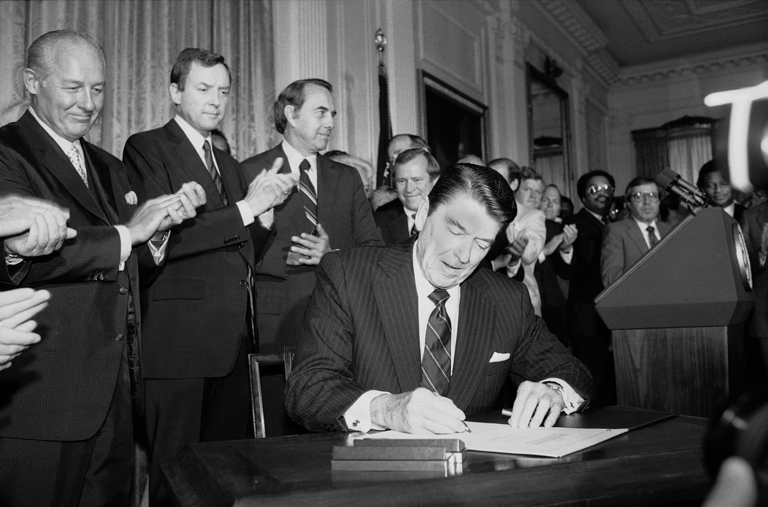 President Ronald Reagan signs an expansion of the 1965 Voting Rights Bill during a ceremony in  the East Room of the White House on June 30, 1982.