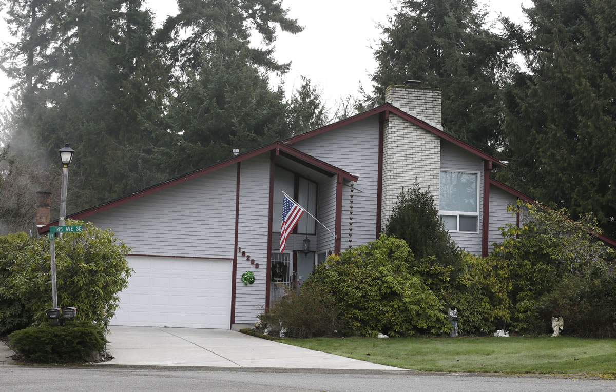 Washington state authorities are looking for Michael &quot;Chad&quot; Boysen, accused of killing his grandparents in this house in Renton, just hours after he was released from prison.