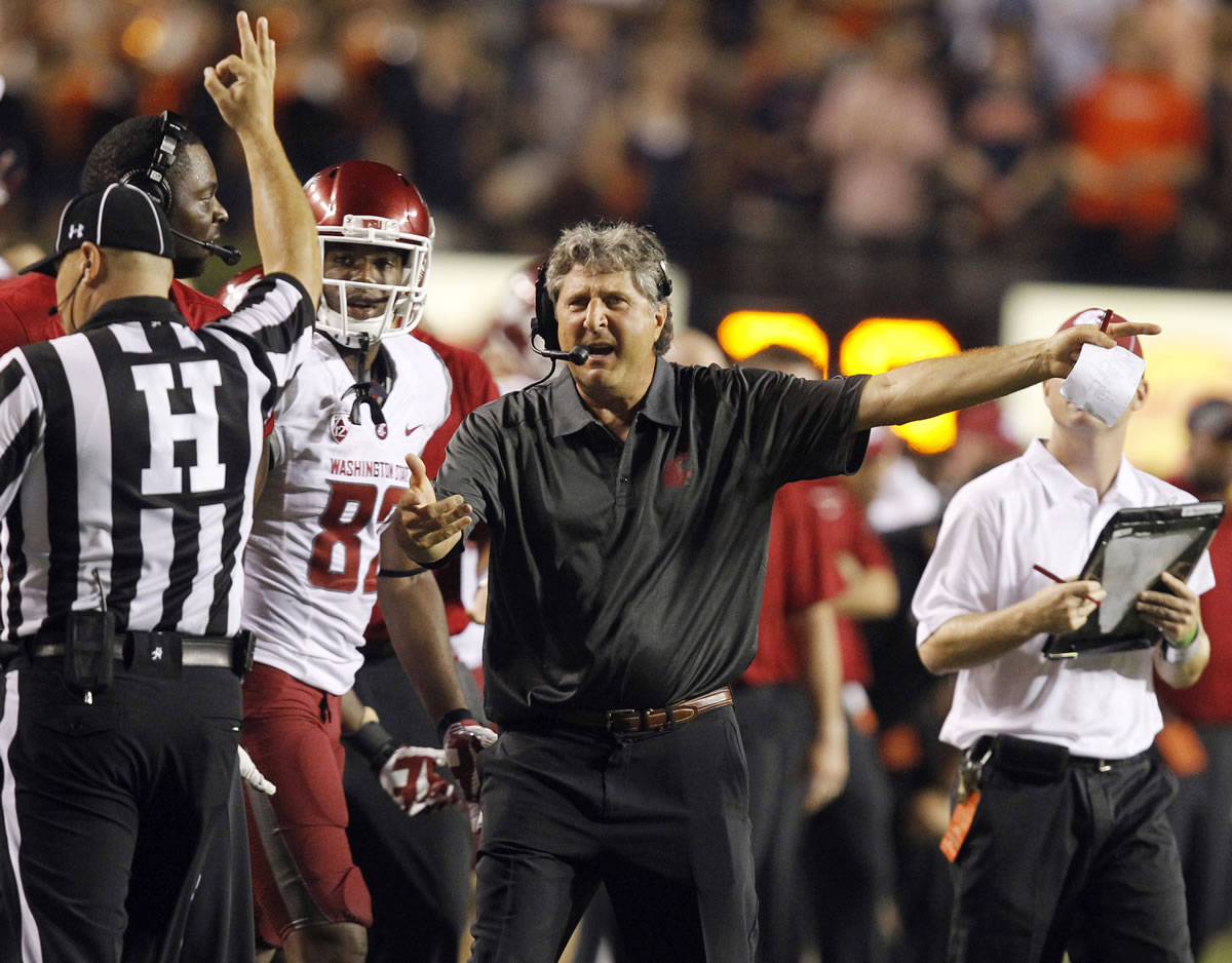 Washington State coach Mike Leach pleads his case after a penalty called against the Cougars last season at Auburn.