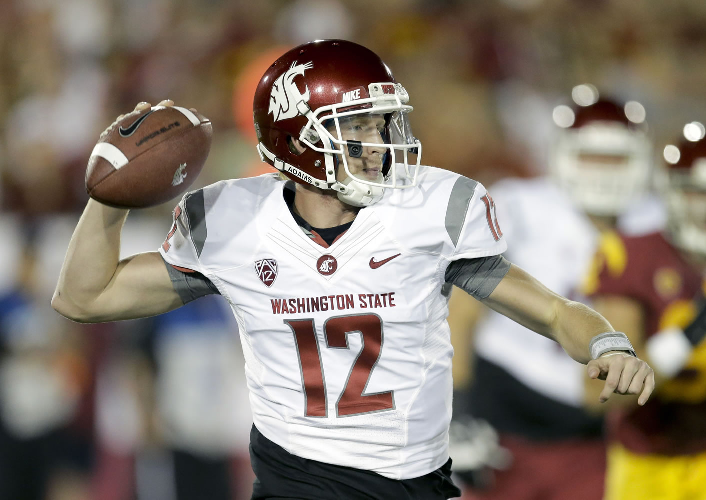 Washington State quarterback Connor Halliday passed for 215 yards and threw two interceptions against USC on Saturday night.