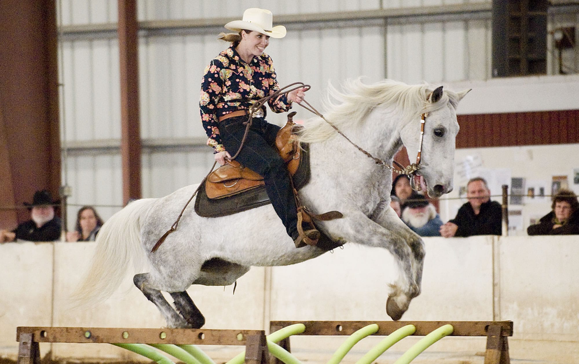 Jessica Bishop, of Scio, Ore., riding Chief Seattle, competes in the Craig Cameron Extreme Cowboy Race at the Washington State Horse Expo, held at the Clark County Event Centeron Feb.