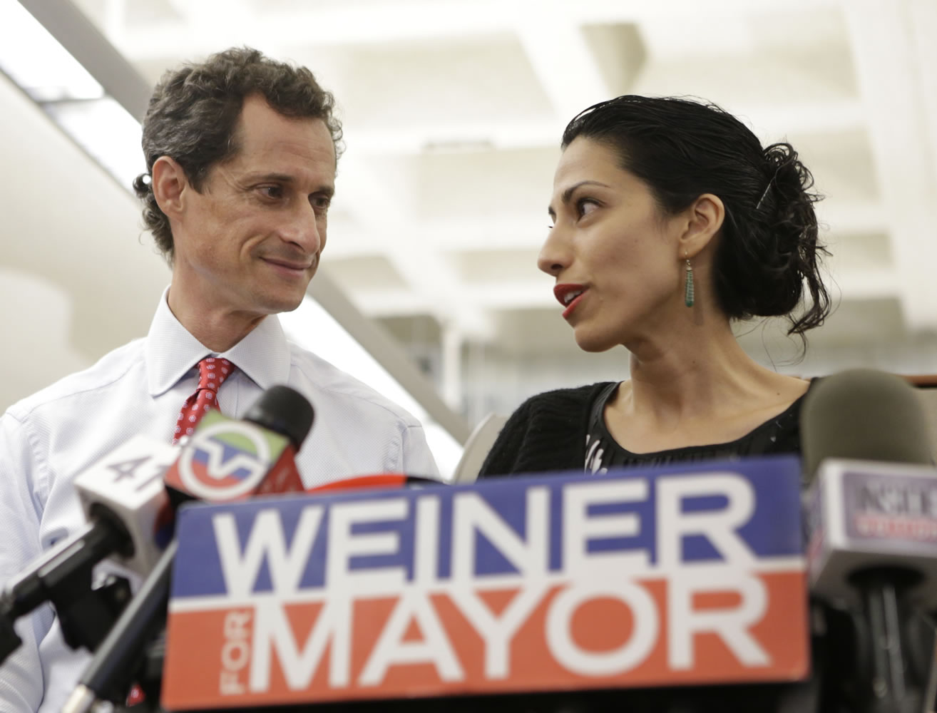 Huma Abedin, alongside her husband, New York mayoral candidate Anthony Weiner, speaks during a news conference at the Gay Men's Health Crisis headquarters in New York on Tuesday.