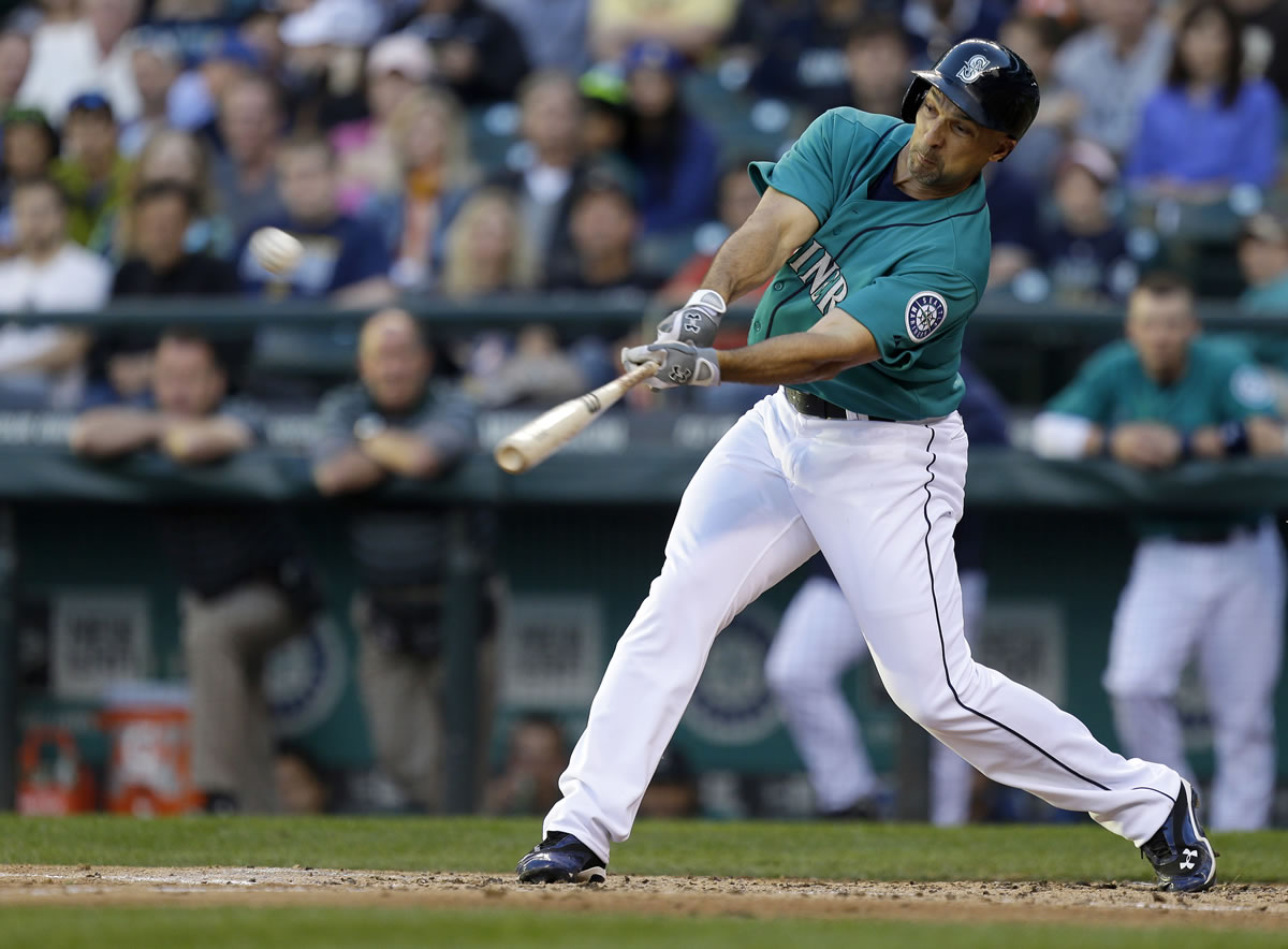 Thee Mariners' Raul Ibanez hits a two-run home run in the third inning of Seattle's win over the Chicago White Sox.