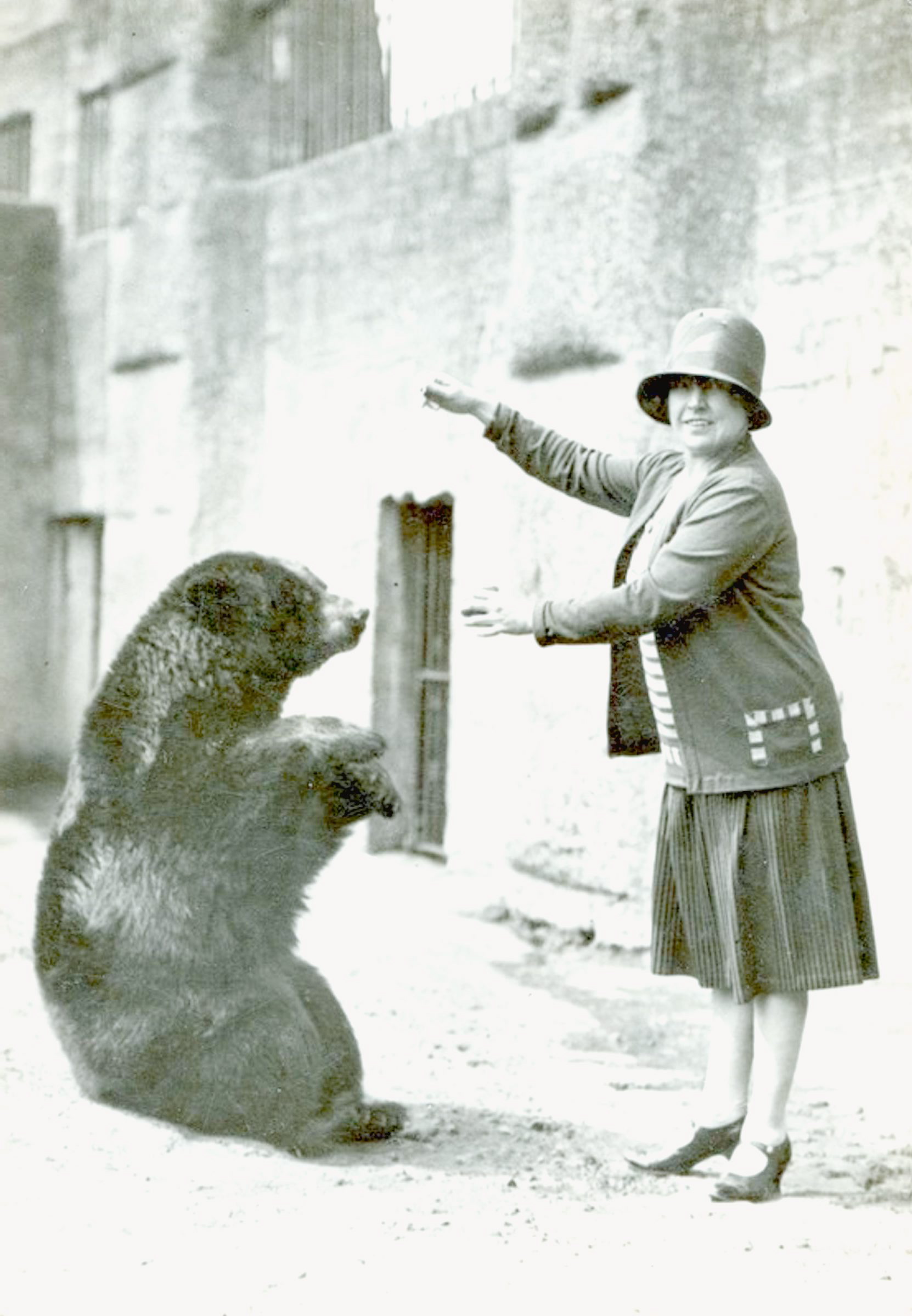 In this undated image an unidentified woman poses with Winnie, the Bear, in London Zoo. The author A A Milne used the bear  as the basis for his popular Winnie the Pooh books. Author Lindsay Mattick?s great-grandfather was on his way to fight in World War I when he bought a bear cub he named Winnie, inspiring author A.A. Milne to create the timeless character Winnie-the-Pooh. Now, Mattick has written a new children?s book chronicling the real-life story behind the bear.