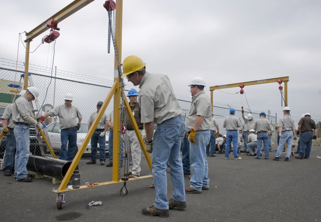 Students at The Northwest Renewable Energy Institute get a lesson in rigging as part of a wind turbine maintenance curriculum in August 2009. The Great Recession appears to have dramatically eroded the number of green industry jobs in Washington, the Employment Security Department said in a study released Monday.