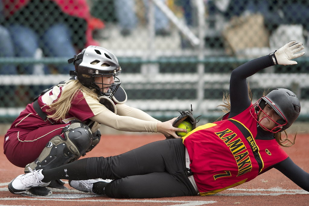 Prairie's Bailee Blechschmidt tags out Kamiakin's Hunter Schneitter for the final out in the top of the seventh inning Saturday.