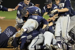 Skyview players celebrate winning the 4A state baseball championship game against South Kitsap in Pasco on Saturday.