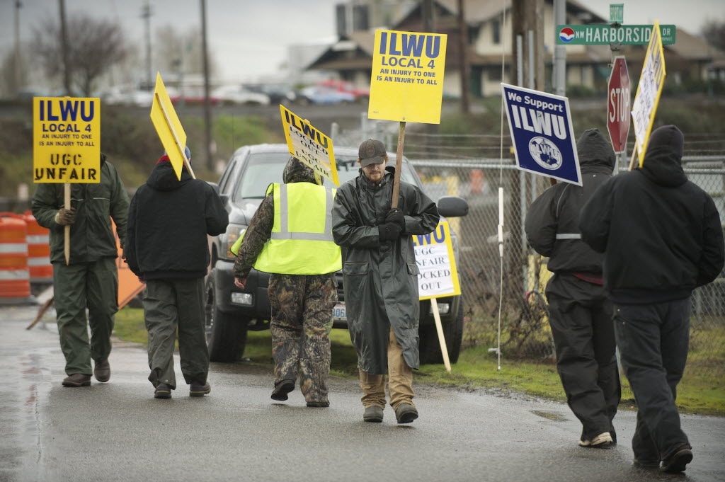 ILWU workers picket for a second day in front of the Port of Vancouver's Gate 2 Thursday February 28, 2013 in Vancouver, Washington.