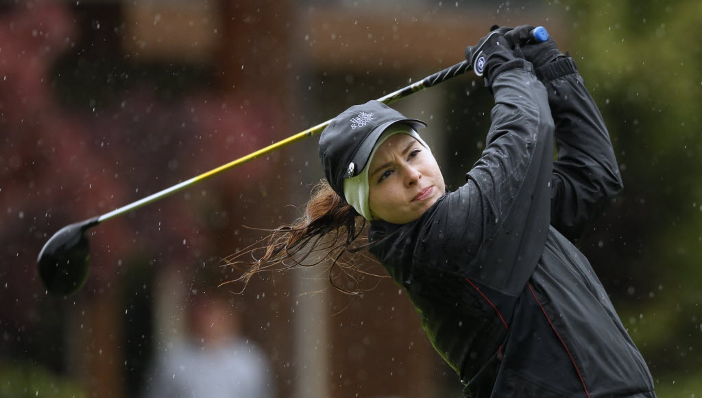 Columbia River's Chloe Bartek hits a tee shot on 10th hole Wednesday at Lewis River Golf Course during second round of 3A girls state championship.