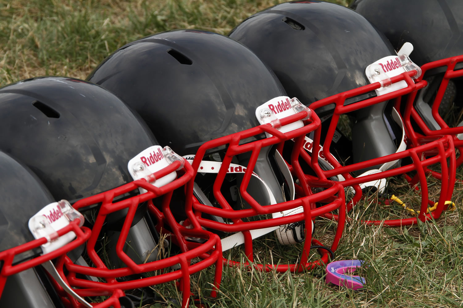 New football helmets that were given to a group of youth football players from the Akron Parents Pee Wee Football League in Akron, Ohio.