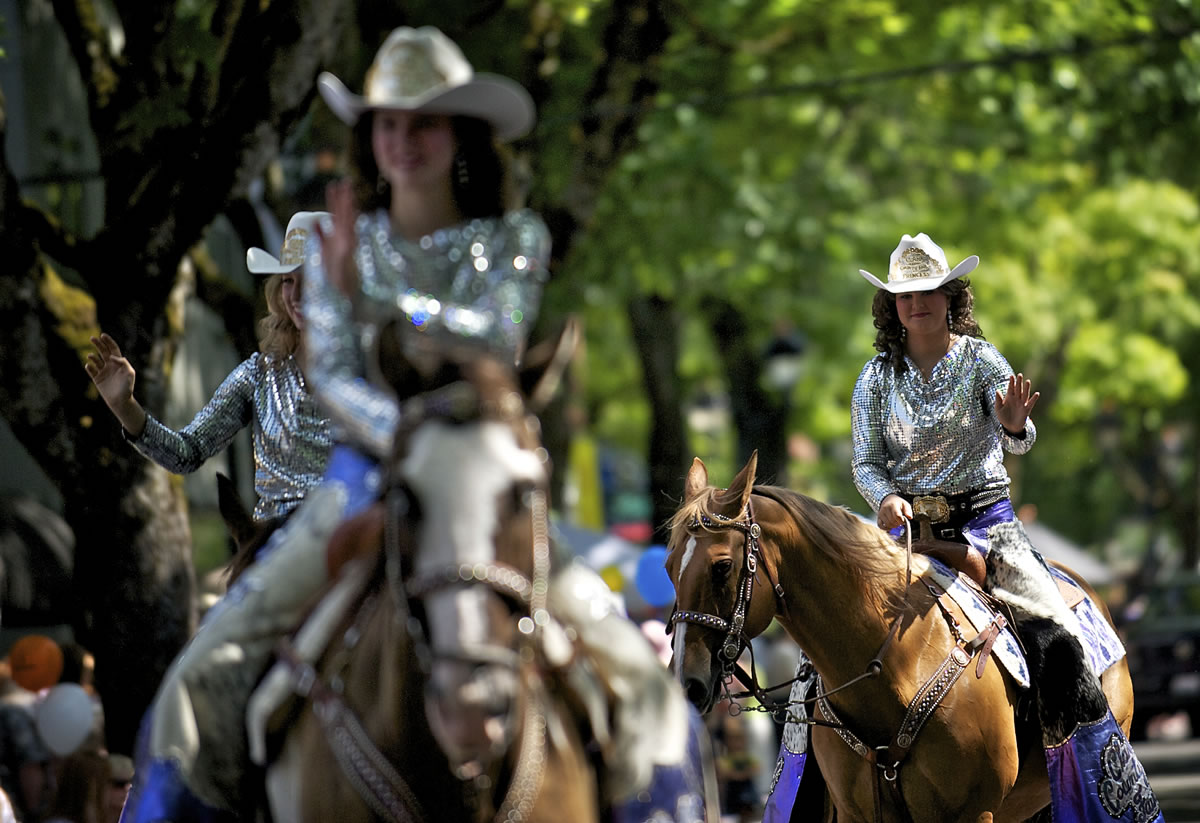 The Clark County Fair Equestrian Court rides down Northeast Fourth Avenue during last year's Camas Days Grand Parade.