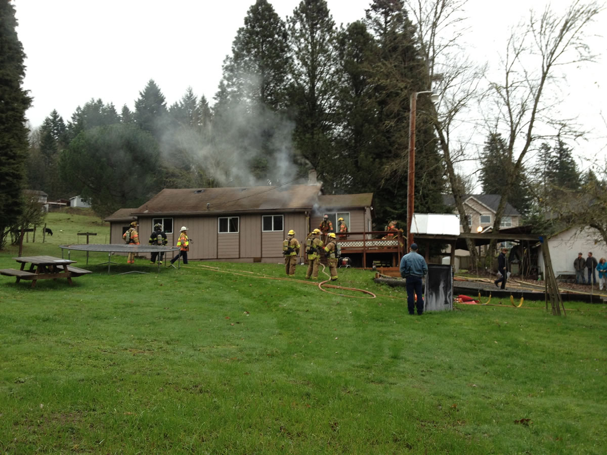 Fire caused extensive damage to the roof of this house at 3405 S.E.