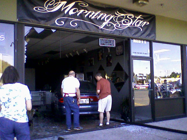 A motorist drove a car through a tattoo parlor in east Vancouver this morning.