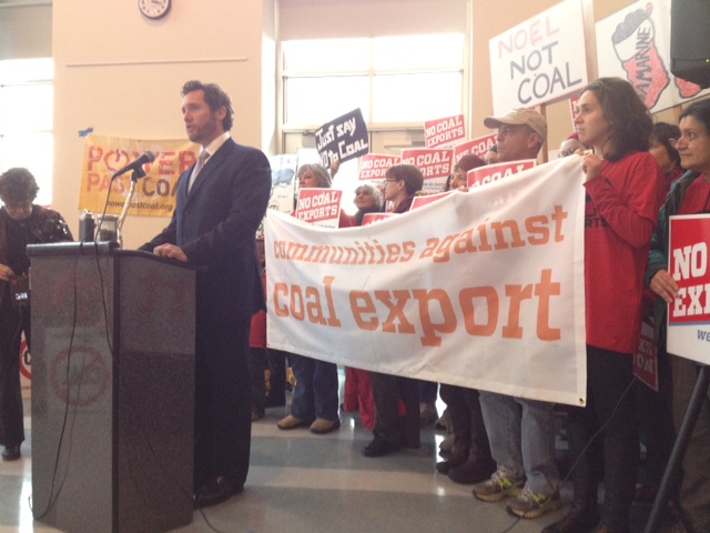 Vancouver Mayor Tim Leavitt speaks out against a proposed coal export facility near Bellingham during an anti-coal event Wednesday before a hearing on the proposal at Clark College.