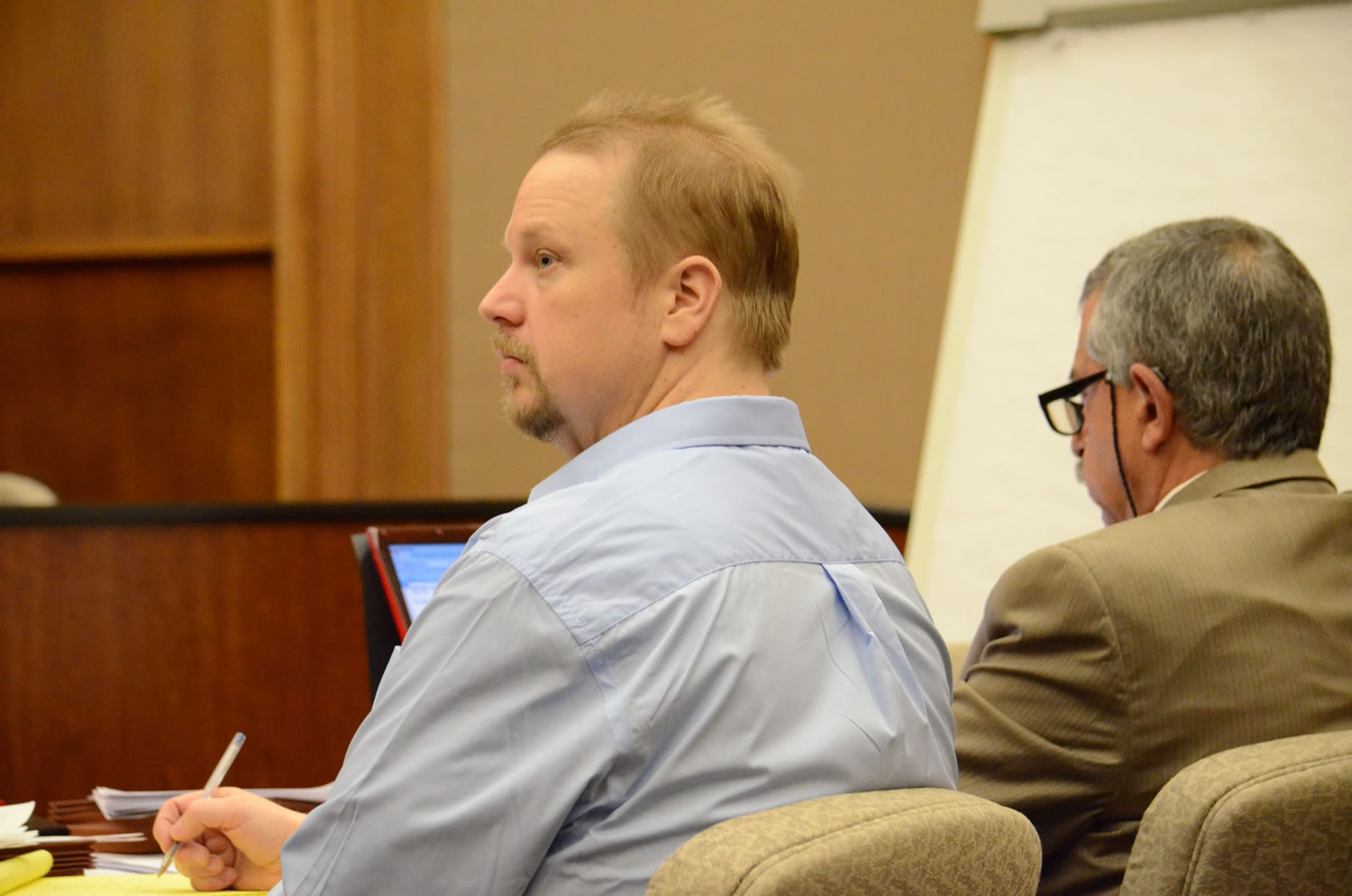 Troy Fisher, accused of killing his father, appeared Tuesday, April 23 in Clark County Superior Court as the defendant passed up a jury trial in favor of a bench trial in which Judge Barbara Johnson will decide his fate.