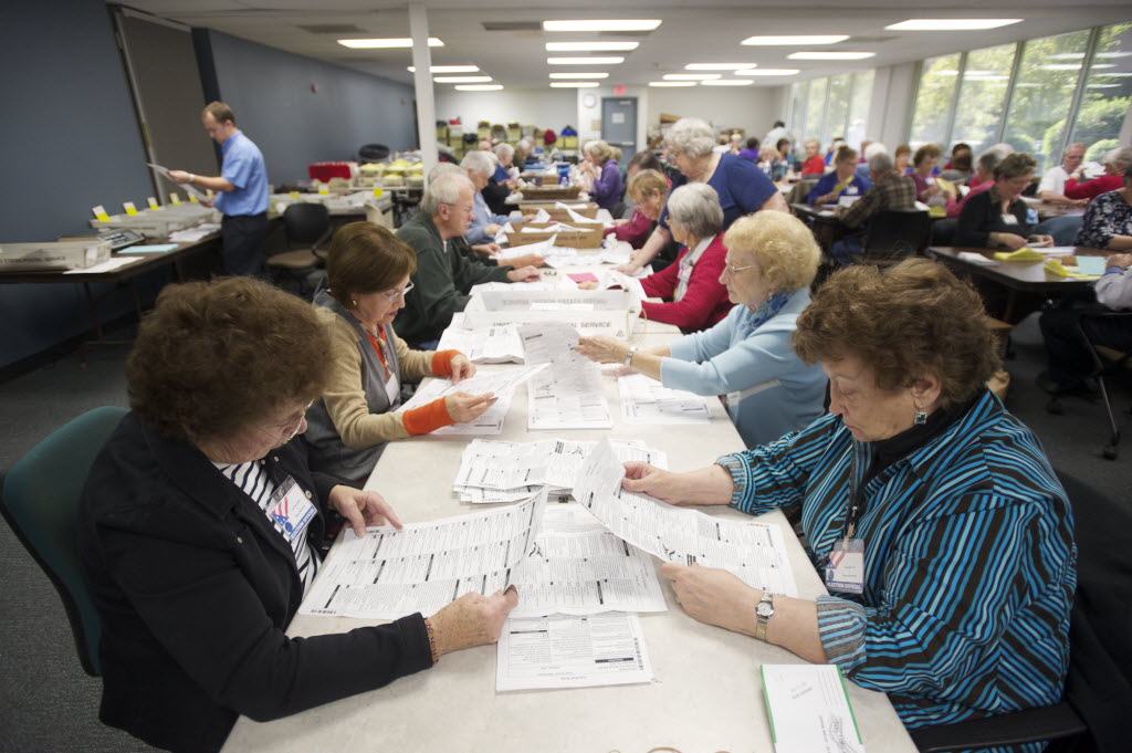 Election Officials sort through ballots at the Clark County Elections Office.